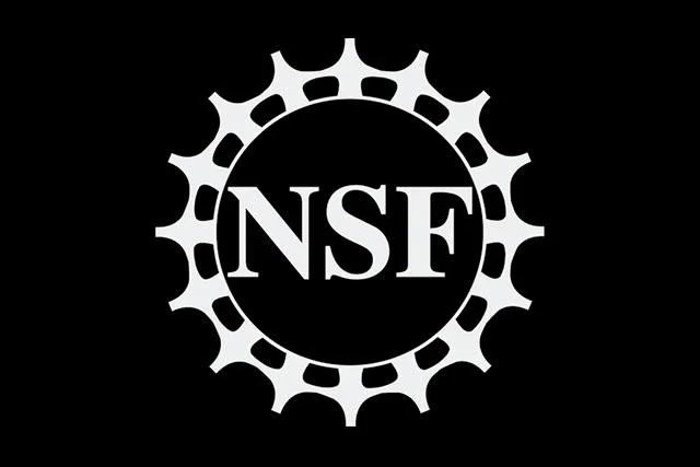 NSF logo with a circular gear design on a black background.